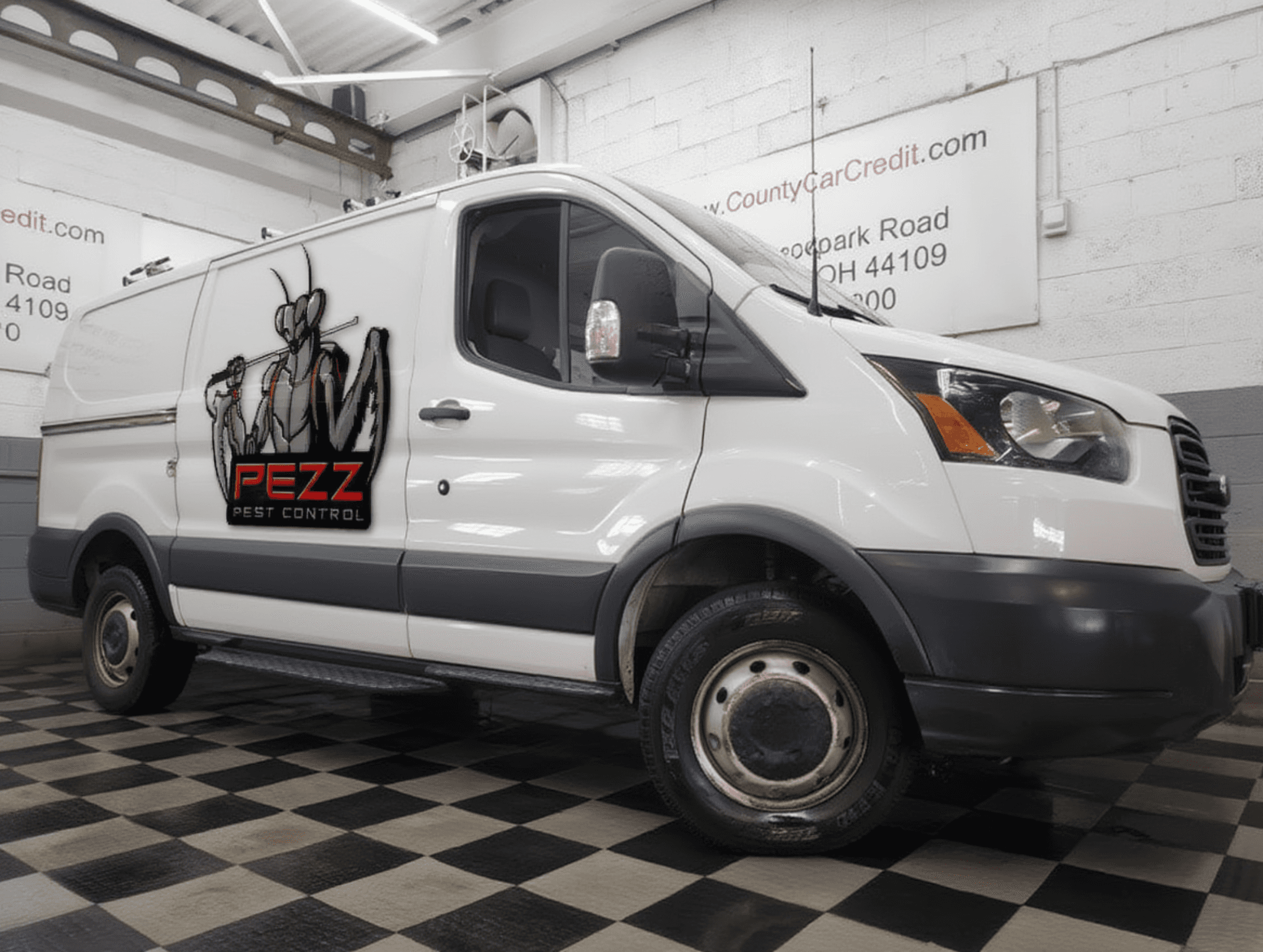 Van with PEZZ Pest Control logo - first proof